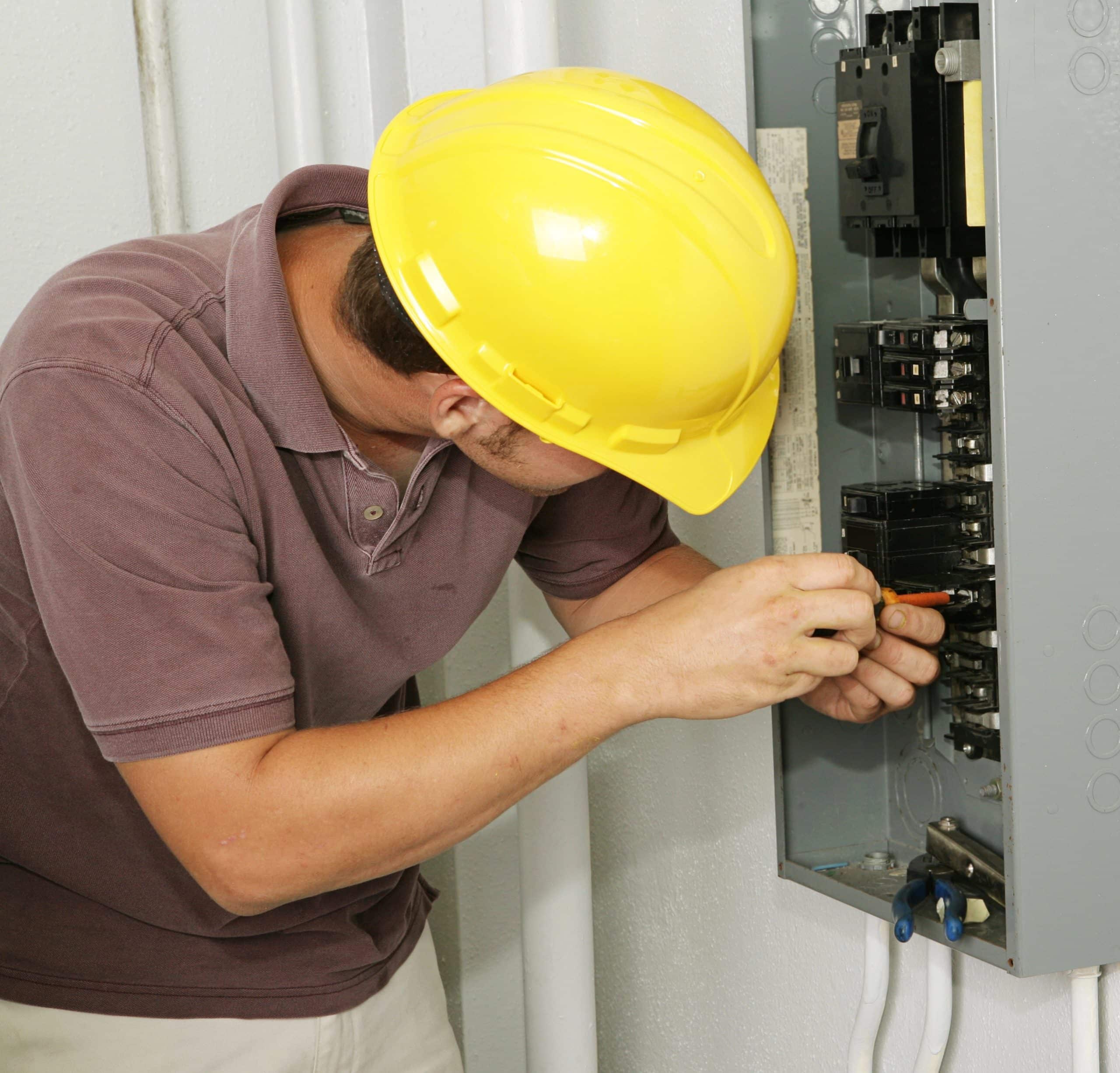 electrician fixing panel