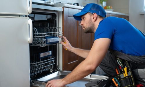 Licensed electrician performing dishwasher installation in Rochester NY Licensed electrician performing dishwasher installation in Rochester NY
